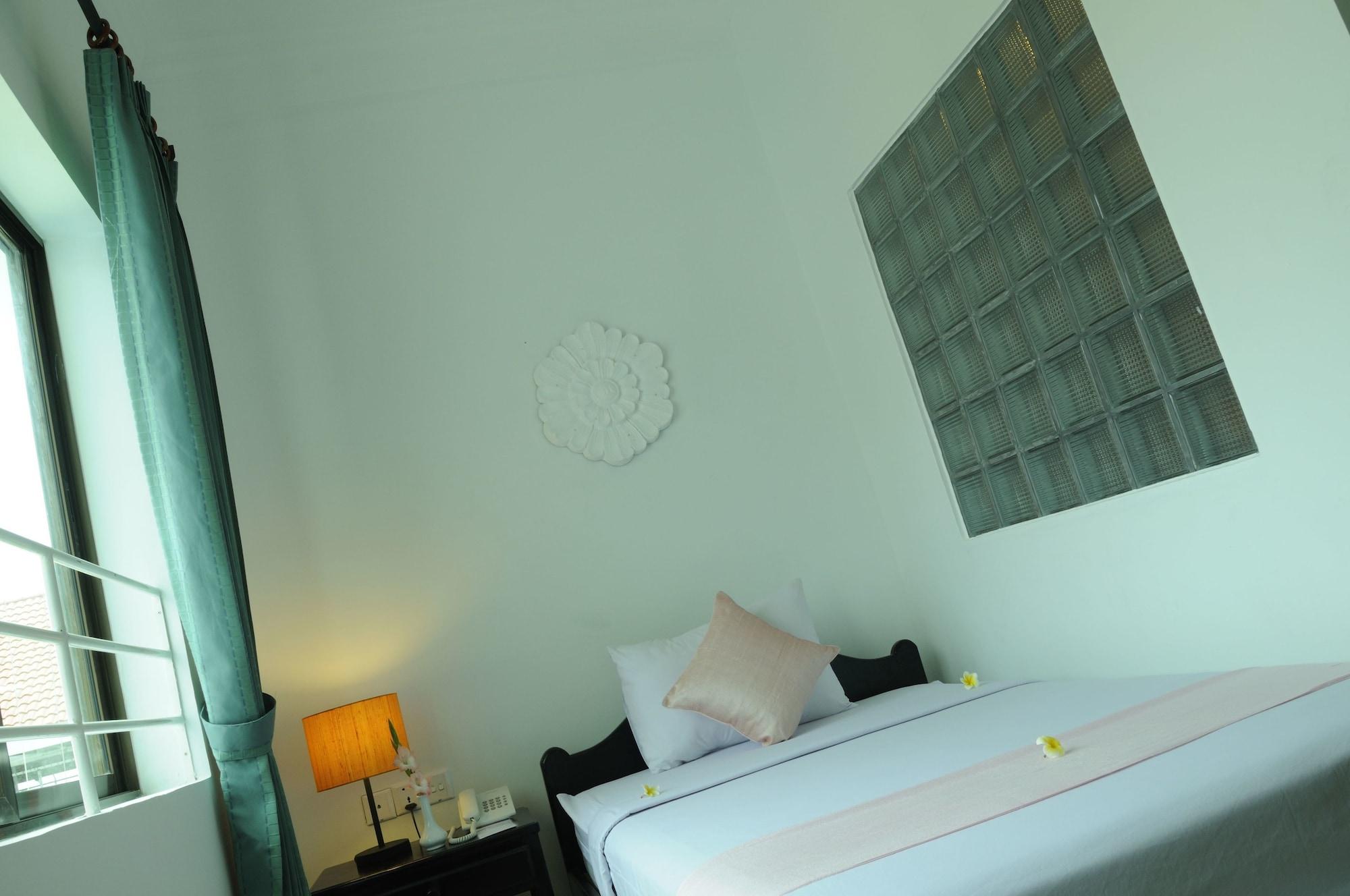 The Frangipani Ii Hotel