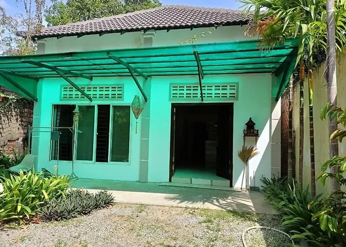 A Two-Bedroom Home With Natural Light And Green Environment