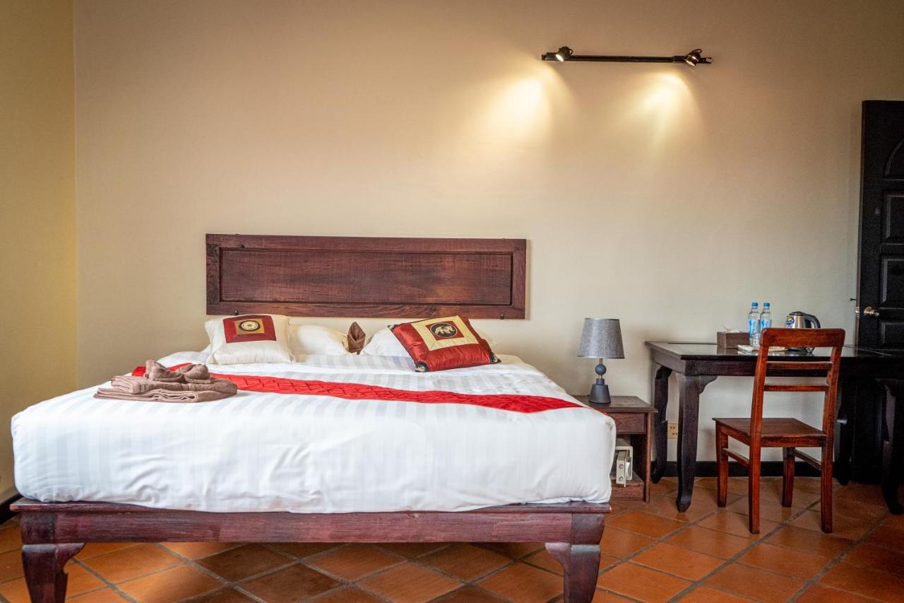Den Totonou Hotel