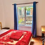 Garden Village Guesthouse & Pool Bar