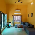 A Two-Bedroom Home With Natural Light And Green Environment